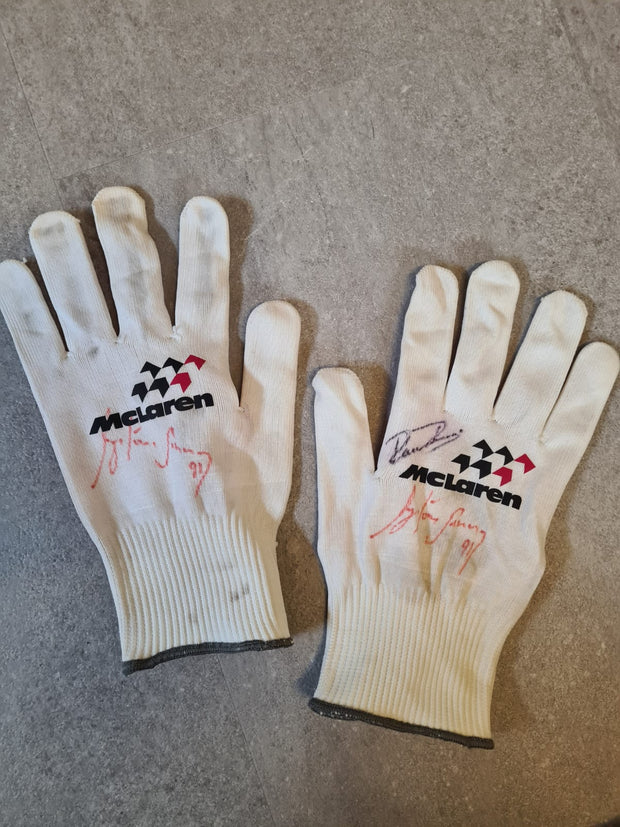1991 McLaren pit crew gloves signed by Ayrton Senna