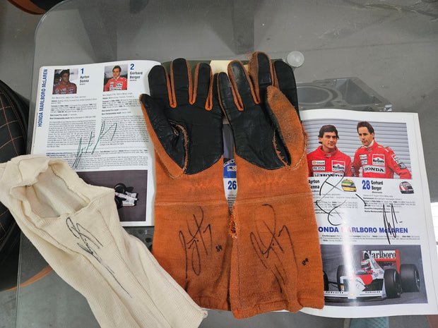 1984 Ayrton Senna Stand 21 used gloves signed