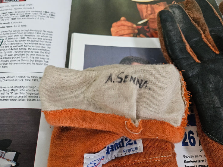 1984 Ayrton Senna Stand 21 used gloves signed