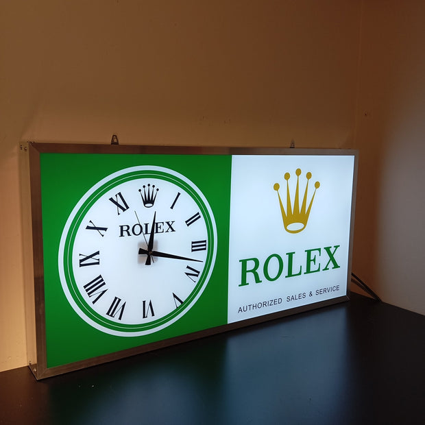 2000s Rolex Zurich official dealer illuminated clock sign