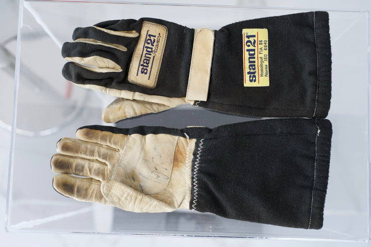 1987 Ayrton Senna Stand 21 race used gloves signed