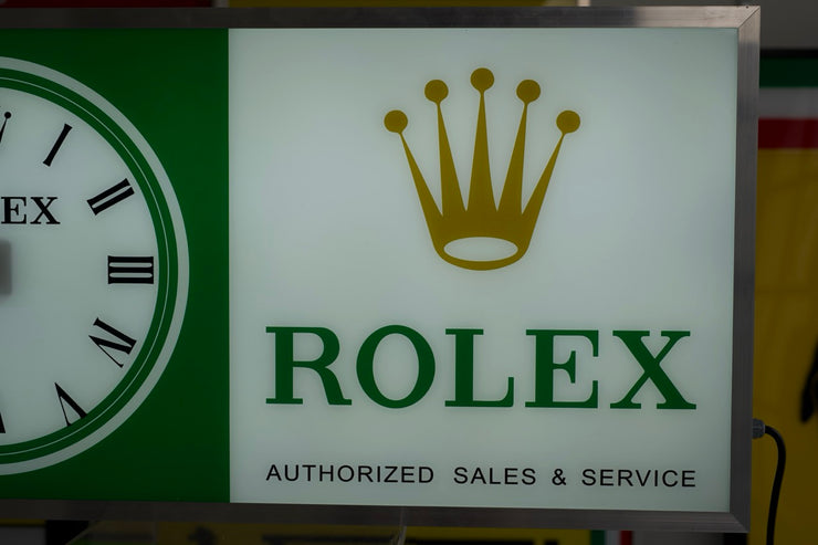 2000s Rolex Zurich official dealer illuminated clock sign