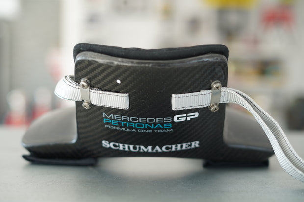 2010 Michael Schumacher race used H.A.N.S system