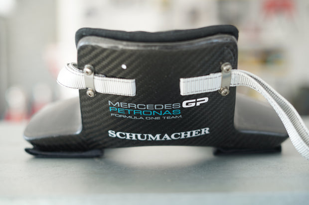 2010 Michael Schumacher race used H.A.N.S system