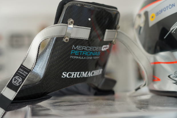 2010 Michael Schumacher race used H.A.N.S system