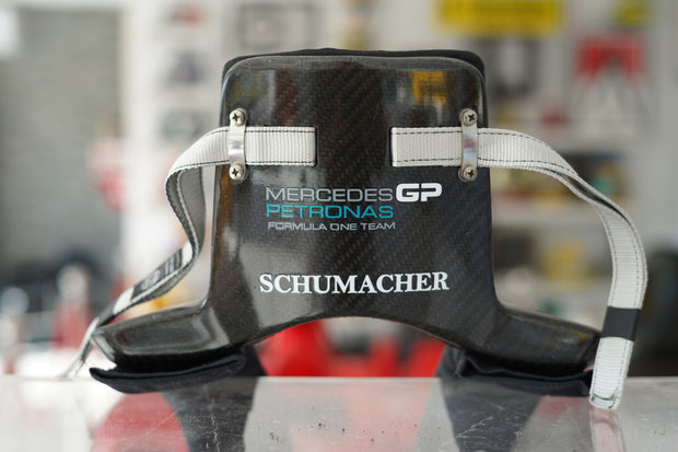 2010 Michael Schumacher race used H.A.N.S system