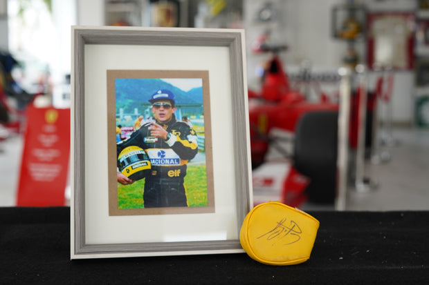 1985 Ayrton Senna personal Camel sunglasses with signed glass holder