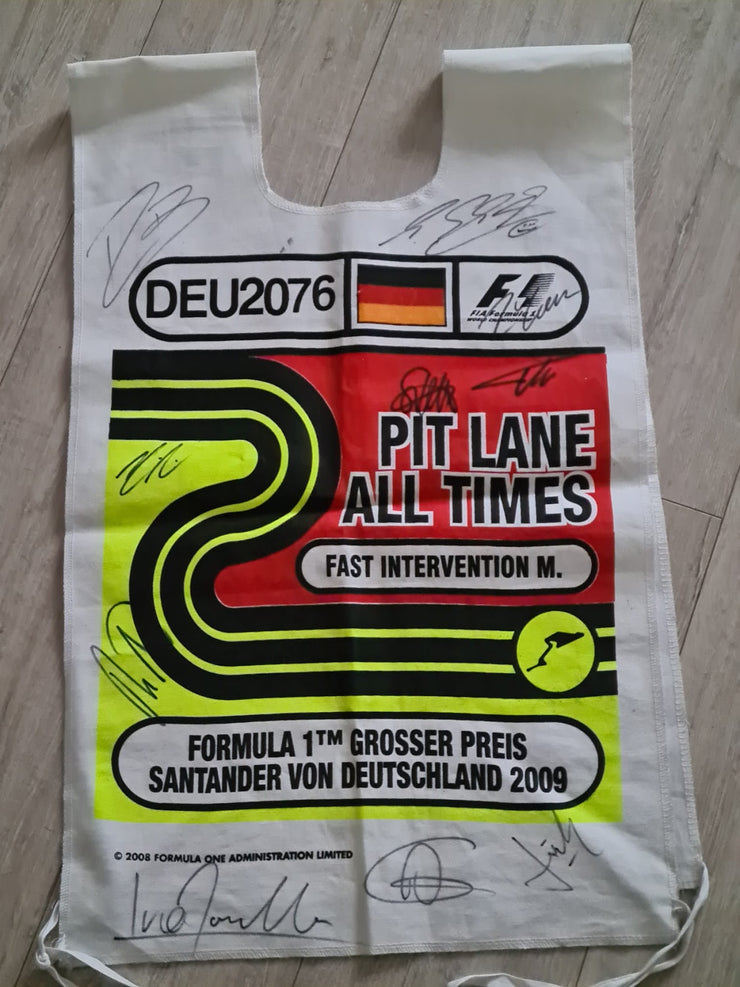 2009 Pit land vest signed by major drivers
