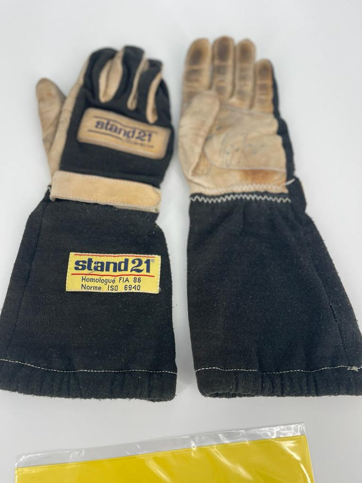 1987 Ayrton Senna Stand 21 race used gloves signed