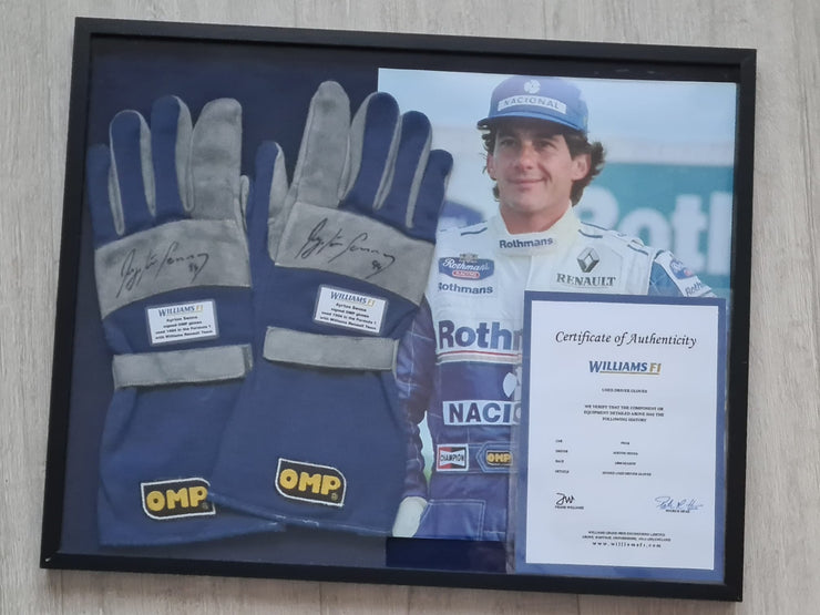 1994 Ayrton Senna OMP race used gloves signed