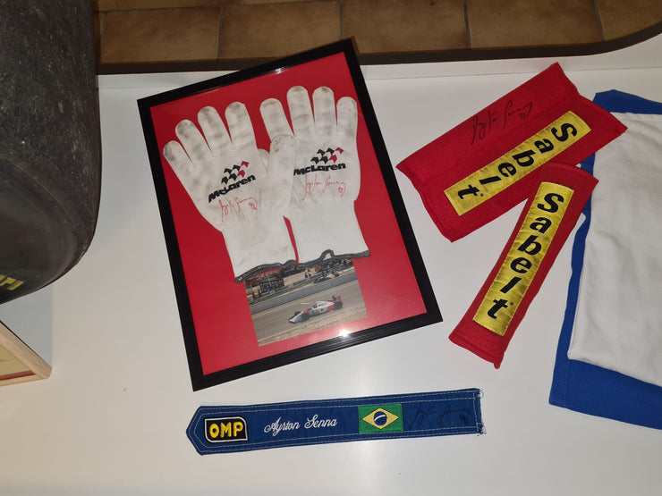 1992 McLaren pit crew gloves signed by Ayrton Senna