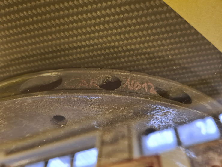 1985 Ayrton Senna Lotus brake disk signed used during the Monaco GP