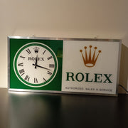 2000s Rolex Zurich official dealer illuminated clock sign