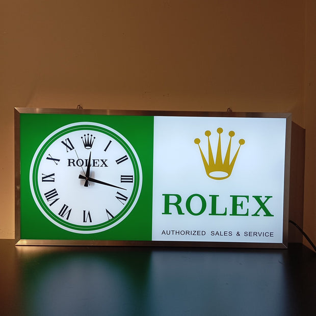 2000s Rolex Zurich official dealer illuminated clock sign