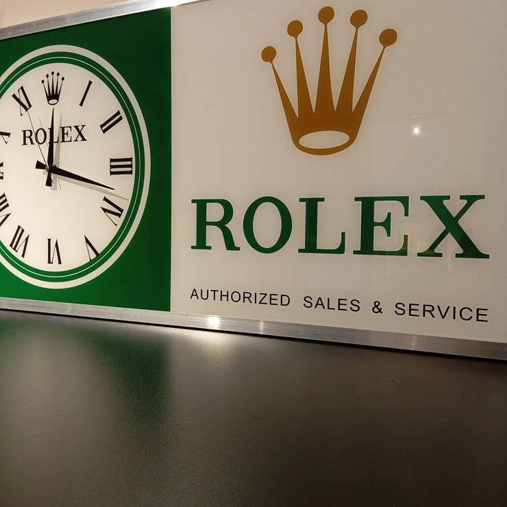 2000s Rolex Zurich official dealer illuminated clock sign