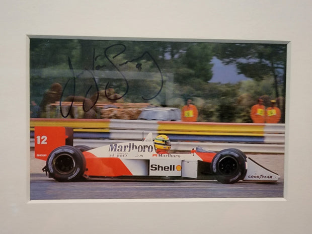 Ayrton Senna framed signed photos and signed paddock pass