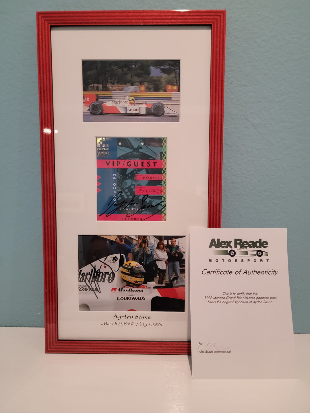 Ayrton Senna framed signed photos and signed paddock pass