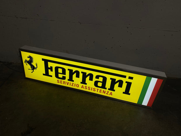 2010s Ferrari Servizio Assistenza dealership long illuminated sign