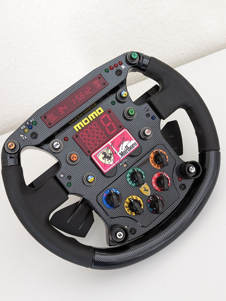 1999 Michael Schumacher replica Ferrari steering signed