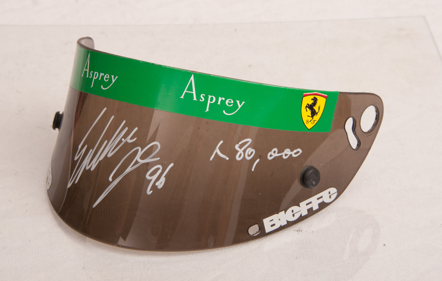 1996 Eddie Irvine Ferrari visor signed – Formula 1 Memorabilia