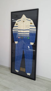 OMP race suit signed by Ayrton Senna