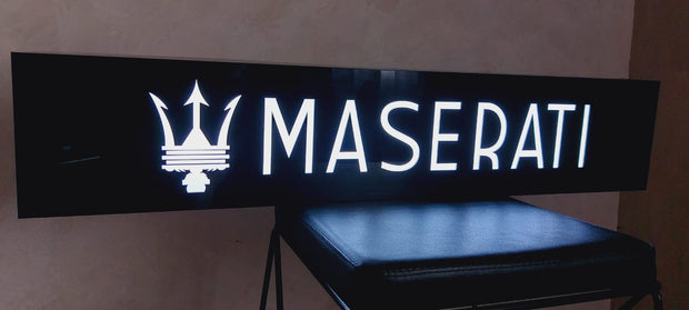 2000s Maserati dealership illuminated sign
