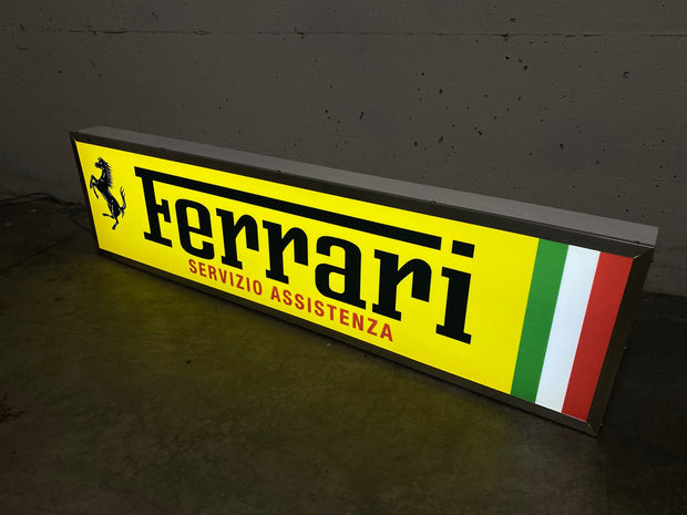 2010s Ferrari Servizio Assistenza dealership long illuminated sign